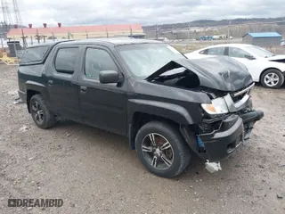 2011 Honda Ridgeline RT with VIN 5FPYK1F24BB010604, listed as a IAAI auction lot 41941553 with 37,814 mi miles. Bid and sale history available at carsss.com. Image 1.