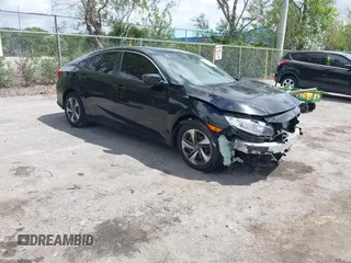 2020 Honda Civic LX z VIN 2HGFC2F61LH600469, wystawiony jako IAAI lot #41958201 z przebiegiem 66 249 mil mil oraz . Historia ofert i sprzedaży dostępna na DreamBid. Obrazek 1.