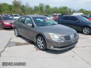2004 Nissan Maxima SL with VIN 1N4BA41E44C921302, listed as a IAAI auction lot 41897015 with 206,848 mi miles. Bid and sale history available at carsss.com. Image 1.