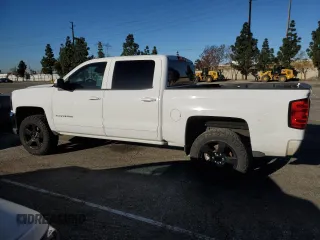 2018 Chevrolet Silverado 1500 LT with VIN 3GCPCREC3JG200722, listed as a Copart auction lot 48405655 with 97,384 mi miles and Salvage Title. Bid and sale history available at DreamBid. Image 2.