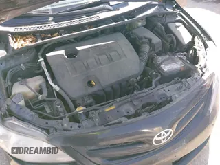 2012 Toyota Corolla L with VIN 5YFBU4EE5CP069365, listed as a IAAI auction lot 41852689 with 220,730 mi miles. Bid and sale history available at carsss.com. Image 10.