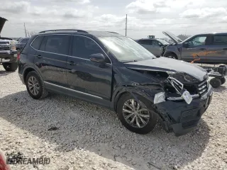 2018 Volkswagen Tiguan SEL with VIN 3VV3B7AX1JM055147, listed as a Copart auction lot 48154705 with 105,097 mi miles and Salvage Title. Bid and sale history available at carsss.com. Image 4.