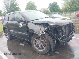 2021 Jeep Grand Cherokee Limited z VIN 1C4RJFBGXMC637709, wystawiony jako IAAI lot #42343424 z przebiegiem 51 318 mil mil oraz . Historia ofert i sprzedaży dostępna na DreamBid. Obrazek 1.