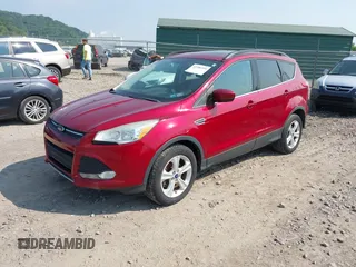 2014 Ford Escape SE z VIN 1FMCU9GX9EUC56559, wystawiony jako IAAI lot #42386594 z przebiegiem 98 722 mil mil oraz . Historia ofert i sprzedaży dostępna na DreamBid. Obrazek 2.