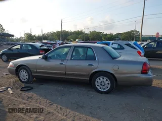 2004 Mercury Grand Marquis GS with VIN 2MEFM74WX4X696703, listed as a IAAI auction lot 42171970 with 149,556 mi miles and . Bid and sale history available at DreamBid. Image 14.