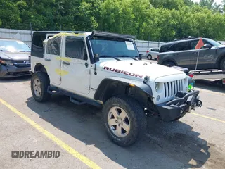 2015 Jeep Wrangler Unlimited Rubicon z VIN 1C4BJWFGXFL755810, wystawiony jako IAAI lot #42495531 z przebiegiem 109 668 mil mil oraz . Historia ofert i sprzedaży dostępna na DreamBid. Obrazek 1.
