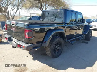2020 Jeep Gladiator Rubicon z VIN 1C6JJTBG0LL117908, wystawiony jako IAAI lot #41621920 z przebiegiem 61 233 mil mil oraz . Historia ofert i sprzedaży dostępna na DreamBid. Obrazek 4.