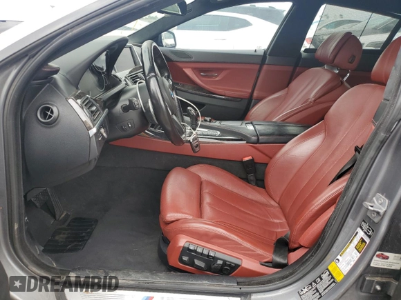 2014 BMW 6 Series 650i xDrive z VIN WBA6B4C53ED371461, wystawiony jako Copart lot #51136055 z przebiegiem 143 213 mil mil oraz Tytuł czysty. Historia ofert i sprzedaży dostępna na DreamBid. Obrazek 7.