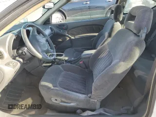 1999 Pontiac Grand Am GT with VIN 1G2NW12EXXM754842, listed as a Copart auction lot 46940335 with 124,886 mi miles and Salvage Title. Bid and sale history available at carsss.com. Image 7.