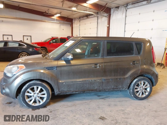 2012 Kia Soul + with VIN KNDJT2A64C7452975, listed as a IAAI auction lot 41635133 with 164,937 mi miles. Bid and sale history available at carsss.com. Image 14.