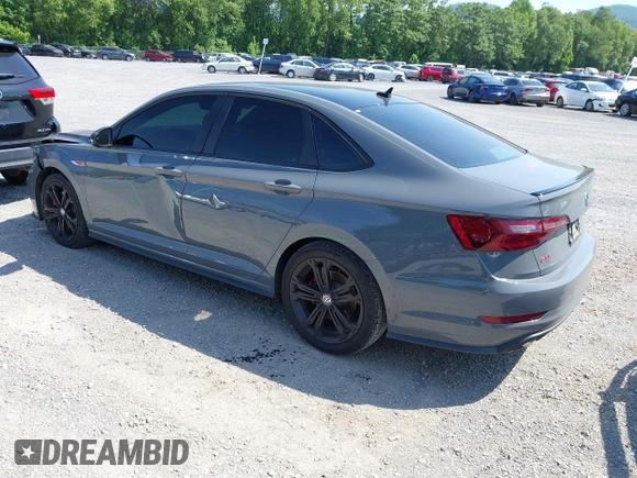 2021 Volkswagen Jetta GLI S z VIN 3VW6T7BU9MM052902, wystawiony jako IAAI lot #42286711 z przebiegiem 91 519 mil mil oraz . Historia ofert i sprzedaży dostępna na DreamBid. Obrazek 3.