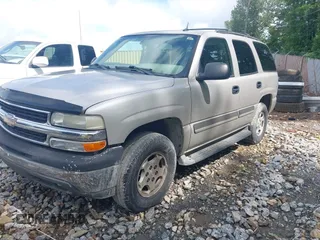 2005 Chevrolet Tahoe LS with VIN 1GNEC13V55R235594, listed as a IAAI auction lot 42245180 with 312,669 mi miles and . Bid and sale history available at DreamBid. Image 2.