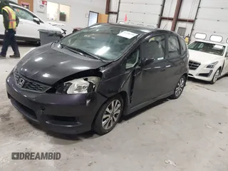 2013 Honda Fit Sport z VIN JHMGE8H56DC019556, wystawiony jako IAAI lot #41140755 z przebiegiem Nie podano mil oraz . Historia ofert i sprzedaży dostępna na DreamBid. Obrazek 18.