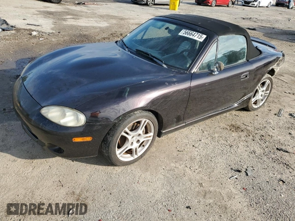 2004 Mazda MX-5 Miata LS with VIN JM1NB353140408906, listed as a Copart auction lot 56664715 with 86,603 mi miles and Salvage title. Bid and sale history available at DreamBid. Image 1.