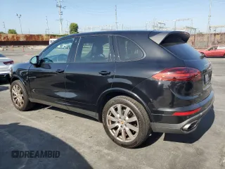 2017 Porsche Cayenne with VIN WP1AA2A20HKA80640, listed as a Copart auction lot 61038585 with 60,893 mi miles and Salvage title. Bid and sale history available at DreamBid. Image 2.