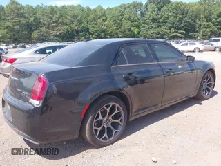 2015 Chrysler 300 with VIN 2C3CCABG1FH807740, listed as a IAAI auction lot 40246268 with 174,037 mi miles. Bid and sale history available at carsss.com. Image 4.