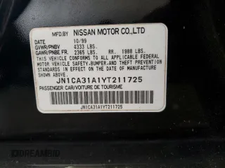 2000 Nissan Maxima GXE z VIN JN1CA31A1YT211725, wystawiony jako Copart lot #47401895 z przebiegiem 122 228 mil mil oraz Szkody całkowita. Historia ofert i sprzedaży dostępna na DreamBid. Obrazek 12.