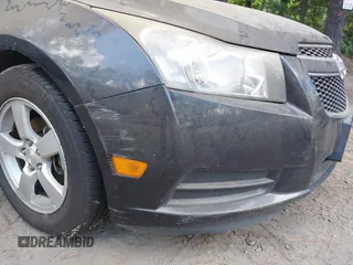 2014 Chevrolet Cruze 1LT with VIN 1G1PC5SB4E7370277, listed as a IAAI auction lot 42646430 with 116,647 mi miles and . Bid and sale history available at DreamBid. Image 6.