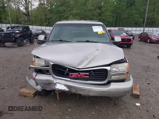 2004 GMC Yukon SLT z VIN 1GKEC13Z24J260630, wystawiony jako IAAI lot #41972913 z przebiegiem 329 286 mil mil oraz . Historia ofert i sprzedaży dostępna na DreamBid. Obrazek 6.