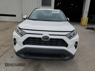 2019 Toyota RAV4 XLE with VIN 2T3P1RFV6KC060285, listed as a Copart auction lot 59195955 with 136,942 mi miles and Salvage title. Bid and sale history available at DreamBid. Image 5.