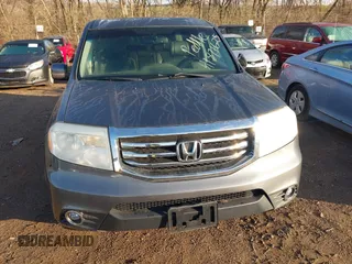 2012 Honda Pilot EX-L with VIN 5FNYF4H52CB034259, listed as a IAAI auction lot 41871625 with 159,577 mi miles and . Bid and sale history available at carsss.com. Image 6.