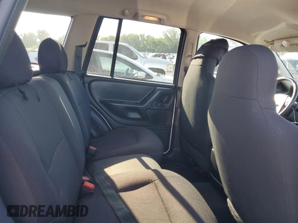 2004 Jeep Grand Cherokee Laredo z VIN 1J4GW48S94C425242, wystawiony jako Copart lot #63118015 z przebiegiem 157 076 mil mil oraz Czysty tytuł • Clean title. Historia ofert i sprzedaży dostępna na DreamBid. Obrazek 11.