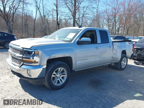 2018 Chevrolet Silverado 1500 LT with VIN 1GCVKREH4JZ323242, listed as a IAAI auction lot 41971945 with 63,915 mi miles and . Bid and sale history available at DreamBid. Image 6.