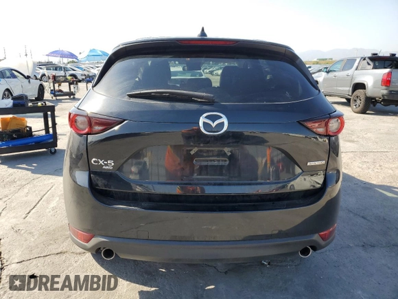 2021 Mazda CX-5 Touring with VIN JM3KFBCM8M0495899, listed as a Copart auction lot 51049235 with 31,164 mi miles and Salvage Title. Bid and sale history available at carsss.com. Image 6.