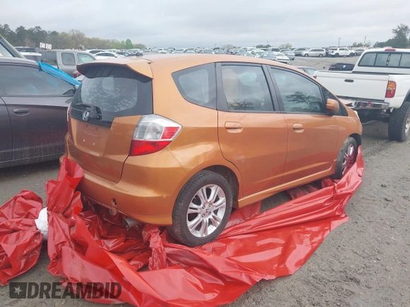 2009 Honda Fit Sport with VIN JHMGE88469S069328, listed as a IAAI auction lot 41464558 with 219,541 mi miles. Bid and sale history available at carsss.com. Image 4.