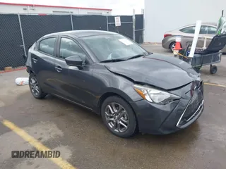 2019 Toyota Yaris Sedan L with VIN 3MYDLBYV1KY512591, listed as a IAAI auction lot 41718058 with 24,870 mi miles. Bid and sale history available at carsss.com. Image 1.