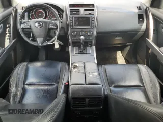 2012 Mazda CX-9 Grand Touring z VIN JM3TB2DAXC0358272, wystawiony jako Copart lot #60703665 z przebiegiem 278 558 mil mil oraz Szkoda całkowita • Salvage title. Historia ofert i sprzedaży dostępna na DreamBid. Obrazek 8.