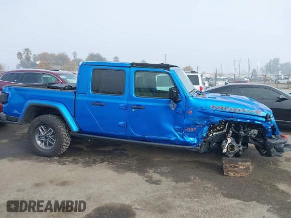 2024 Jeep Gladiator Mojave X z VIN 1C6JJTEG5RL121313, wystawiony jako IAAI lot #41013599 z przebiegiem 2 952 mil mil oraz . Historia ofert i sprzedaży dostępna na DreamBid. Obrazek 14.