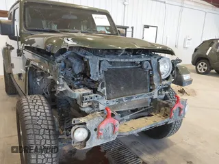 2021 Jeep Wrangler Unlimited Sahara z VIN 1C4HJXEN2MW592565, wystawiony jako IAAI lot #41956072 z przebiegiem 95 504 mil mil oraz . Historia ofert i sprzedaży dostępna na DreamBid. Obrazek 6.