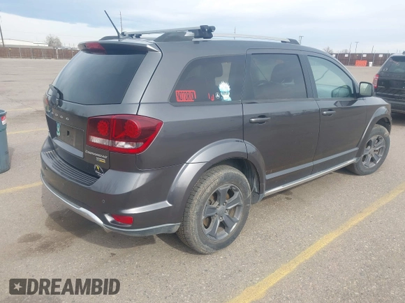 2017 Dodge Journey Crossroad Plus with VIN 3C4PDCGG1HT613928, listed as a IAAI auction lot 41855243 with 134,068 mi miles and . Bid and sale history available at DreamBid. Image 4.
