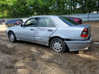1999 Mercedes-Benz C 230/260/280/320 with VIN WDBHA24G4XA749633, listed as a Copart auction lot 56560105 with 221,306 mi miles and Salvage title. Bid and sale history available at DreamBid. Image 2.