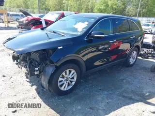 2019 Kia Sorento L with VIN 5XYPG4A38KG574269, listed as a IAAI auction lot 42003610 with 129,896 mi miles and . Bid and sale history available at DreamBid. Image 2.