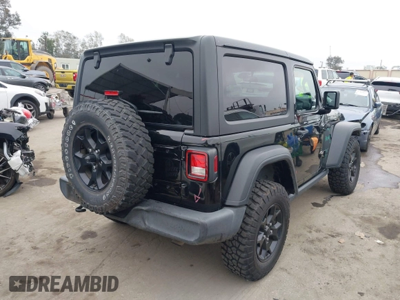 2021 Jeep Wrangler Sport with VIN 1C4GJXAN5MW627228, listed as a IAAI auction lot 42170010 with 56,965 mi miles and . Bid and sale history available at DreamBid. Image 4.