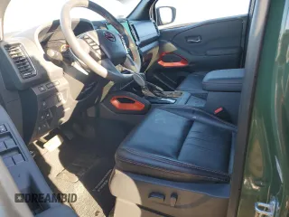 2024 Nissan Frontier SV with VIN 1N6ED1EK0RN607085, listed as a Copart auction lot 79706324 with 8,541 mi miles and Salvage title. Bid and sale history available at DreamBid. Image 7.
