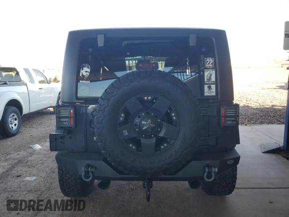 2017 Jeep Wrangler Sport with VIN 1C4AJWAG5HL662456, listed as a Copart auction lot 50166505 with 61,249 mi miles and Salvage Title. Bid and sale history available at DreamBid. Image 6.