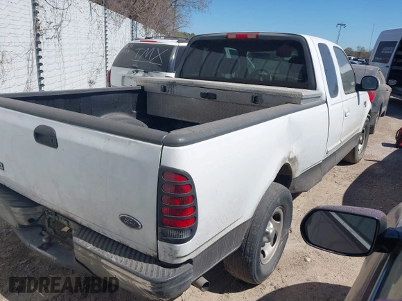 2003 Ford F-150 XL with VIN 1FTRX17W33NB65471, listed as a IAAI auction lot 41627618 with 1 mi miles. Bid and sale history available at carsss.com. Image 4.