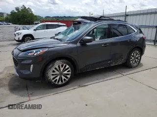 2020 Ford Escape Titanium Hybrid с VIN 1FMCU0DZ5LUC42835, выставлен на аукционе Copart как лот 64339785 с пробегом 83 515 миль миль и На запчасти • Non repairable. История ставок и продаж доступна на DreamBid. Изображение 1.