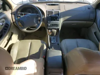 2001 Nissan Maxima SE 20th Anniversary. z VIN JN1CA31A81T313061, wystawiony jako Copart lot #72608504 z przebiegiem 200 484 mil mil oraz Szkoda całkowita • Salvage title. Historia ofert i sprzedaży dostępna na DreamBid. Obrazek 8.