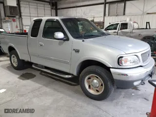 2000 Ford F-150 XL with VIN 1FTRX18L4YNB66317, listed as a IAAI auction lot 41932247 with 1 mi miles. Bid and sale history available at carsss.com. Image 1.