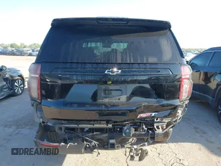 2023 Chevrolet Tahoe RST z VIN 1GNSCRKD3PR365659, wystawiony jako IAAI lot #41975472 z przebiegiem 42 264 mil mil oraz . Historia ofert i sprzedaży dostępna na DreamBid. Obrazek 6.