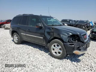 2004 GMC Envoy SLT with VIN 1GKDT13S842421586, listed as a Copart auction lot 51936515 with 188,977 mi miles and Salvage title. Bid and sale history available at DreamBid. Image 4.