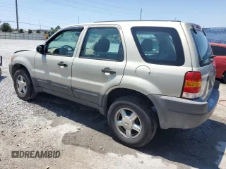 2004 Ford Escape with VIN 1FMCU02184KB21677, listed as a Copart auction lot 58401445 with 102,508 mi miles and Salvage title. Bid and sale history available at DreamBid. Image 2.