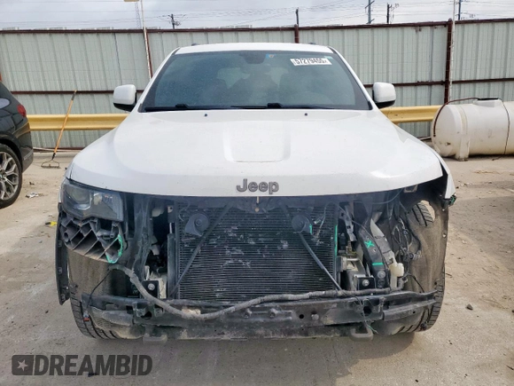 2017 Jeep Grand Cherokee Laredo z VIN 1C4RJFAG9HC620326, wystawiony jako Copart lot #57279455 z przebiegiem 169 750 mil mil oraz Szkoda całkowita • Salvage title. Historia ofert i sprzedaży dostępna na DreamBid. Obrazek 5.