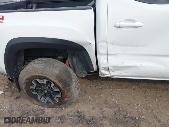 2023 Toyota Tacoma SR z VIN 3TMCZ5AN1PM637609, wystawiony jako IAAI lot #40345917 z przebiegiem 12 614 mil mil oraz . Historia ofert i sprzedaży dostępna na DreamBid. Obrazek 18.