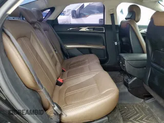 2015 Lincoln MKZ с VIN 3LN6L2J99FR608534, выставлен на аукционе Copart как лот 63588325 с пробегом 96 684 миль миль и Списание • Salvage title. История ставок и продаж доступна на DreamBid. Изображение 10.