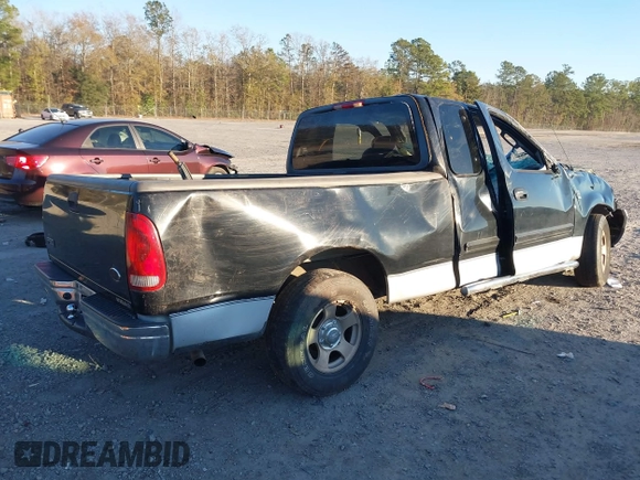 2003 Ford F-150 XL with VIN 1FTRX17W73NA09918, listed as a IAAI auction lot 41296725 with 1 mi miles. Bid and sale history available at carsss.com. Image 4.